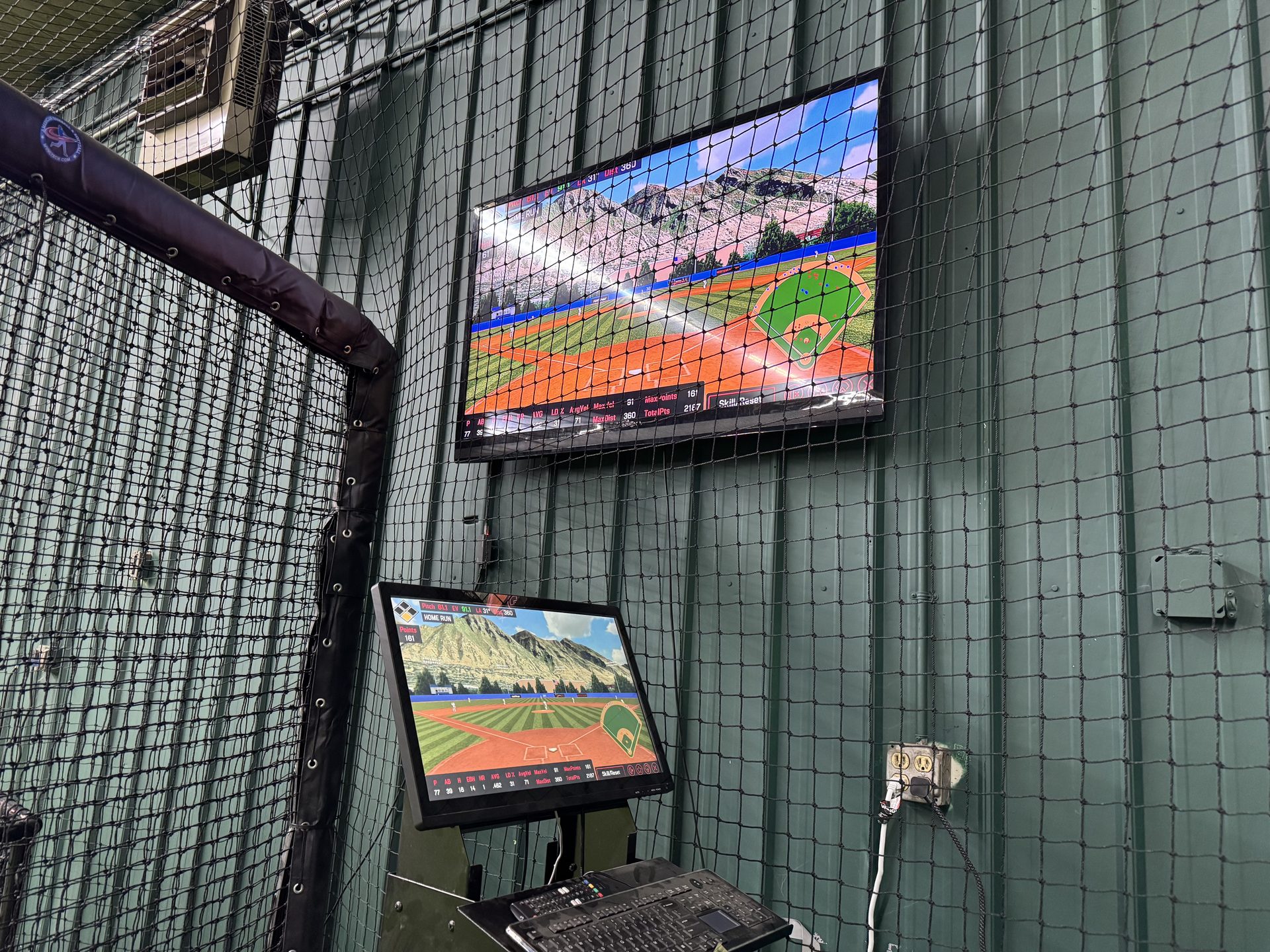 HitTrax dual screen simulator setup at Chenango SportsZone