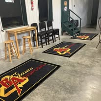 Chenango SportsZone lobby entrance with branded mats