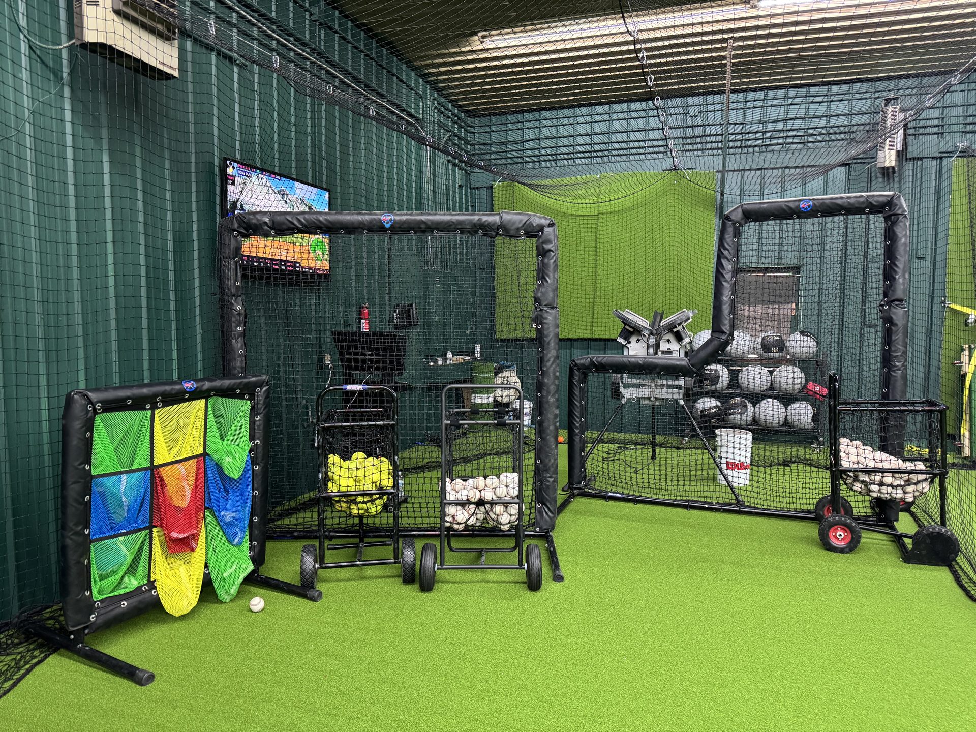 Pitching machines, ball carts, and training equipment at Chenango SportsZone